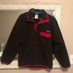 Brown with red, Patagonia Synchilla pullover.